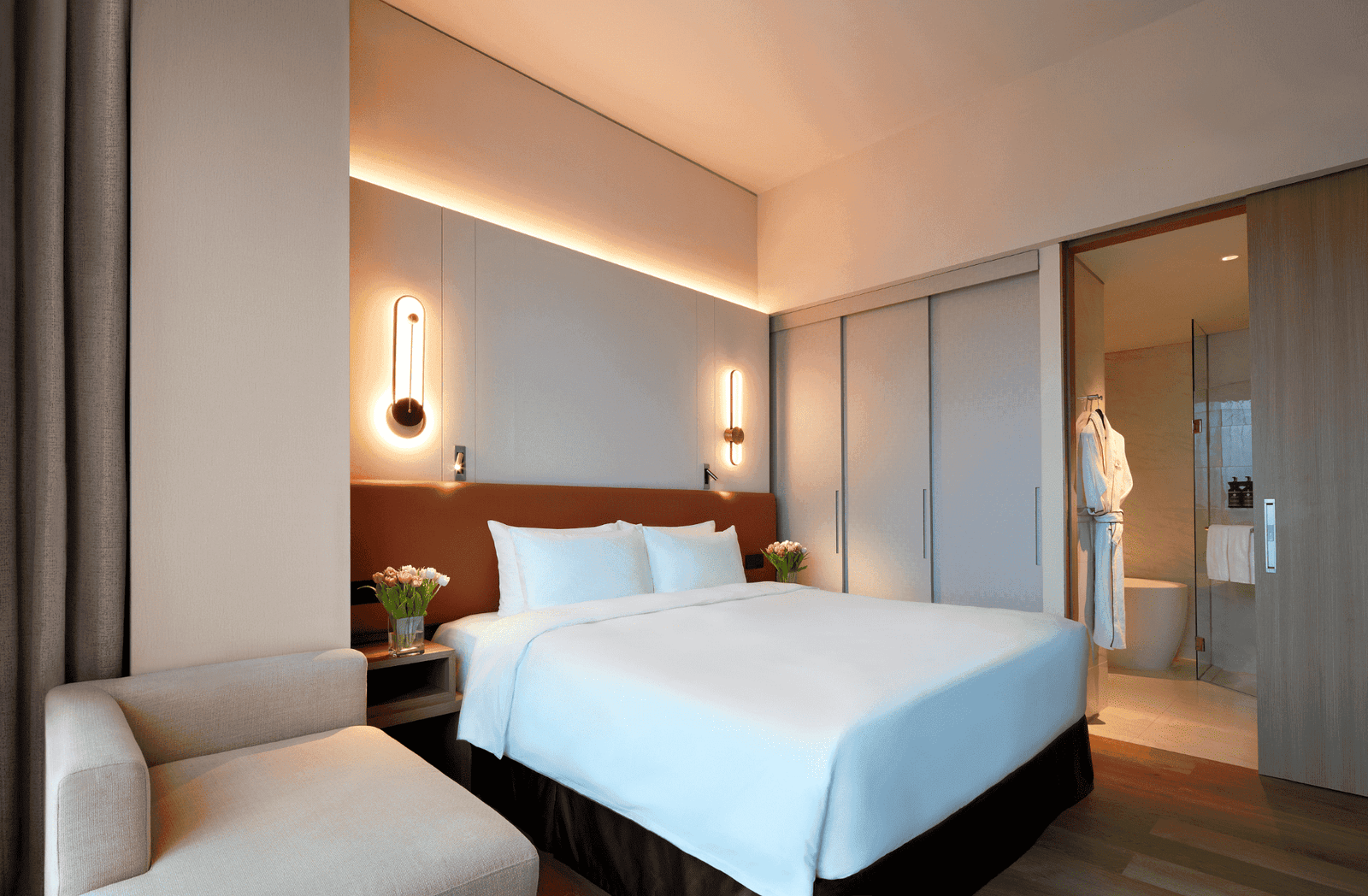 King bed in the Executive Suite with wooden floors at Momentus Hotel Alexandra